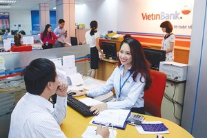 VietinBank đang phải tính đến M&A để tăng vốn, đáp ứng tiêu chuẩn của Hiệp ước Basel II. Ảnh: Chí Cường