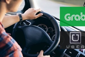 Thương vụ mua bán - sáp nhập giữa Grab và Uber có dấu hiệu vi phạm Luật Cạnh tranh 2004.