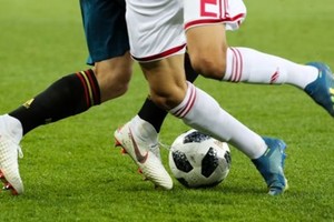 Hai cầu thủ đi giày Adidas và Nike tại World Cup năm nay. Ảnh: TASS.