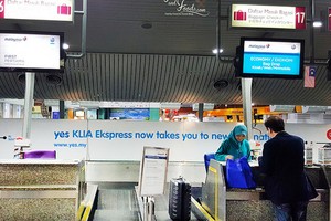 Quầy làm thủ tục của hãng hàng không đặt tại nhà ga trung tâm Kuala Lumpur. Ảnh minh họa: KL. 