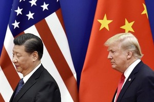 Chủ tịch Trung Quốc - Tập Cận Bình và Tổng thống Mỹ - Donald Trump. Ảnh: Kyodo.