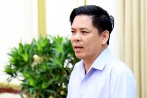 Bộ trưởng Nguyễn Văn Thể phát biểu tại cuộc họp. Ảnh: Hữu Công.