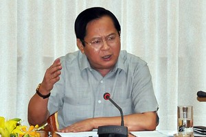 Ông Nguyễn Hữu Tín trong buổi làm việc năm 2014.