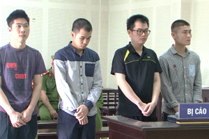 Bốn bị cáo tại phiên tòa hôm nay. Ảnh: Quang Khải