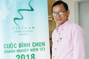Ông Tôn Thất Hạc Minh - Thành viên Hội đồng bình chọn Báo cáo phát triển bền vững - Cuộc bình chọn Doanh nghiệp niêm yết Việt Nam 2018.