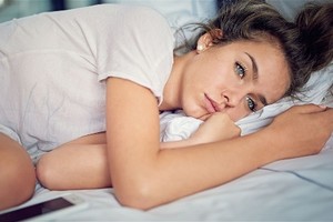 52% người Mỹ trưởng thành được hỏi thừa nhận từng khóc vì chuyện tiền bạc. Ảnh: AFP.