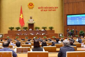 Quốc hội biểu quyết thông qua toàn văn Nghị quyết phê chuẩn Hiệp định Đối tác Toàn diện và Tiến bộ xuyên Thái Bình Dương (CPTPP) cùng các văn kiện liên quan. (Ảnh: Phương Hoa/TTXVN).