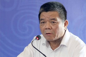 Ông Trần Bắc Hà khi còn làm lãnh đạo ngân hàng BIDV. Ảnh: TTXVN.