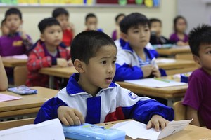 Học sinh tiểu học trong kỳ thi Toán học Kangaroo năm 2018. Ảnh:Dương Tâm.