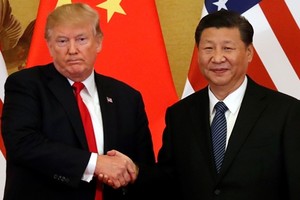 Tổng thống Mỹ Trump (trái) và Chủ tịch Trung Quốc Tập Cận Bình ở Bắc Kinh tháng 11/2017. Ảnh: Reuters.