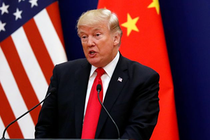 Tổng thống Mỹ Donald Trump tại một sự kiện ở Trung Quốc năm 2017. Ảnh: Reuters.