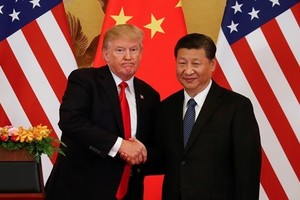 Tổng thống Mỹ Donald Trump (trái) và Chủ tịch Trung Quốc Tập Cận Bình. Ảnh: Reuters.