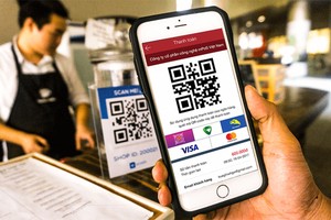 QR code - một hình thức thanh toán hiện đại cho người tiêu dùng.