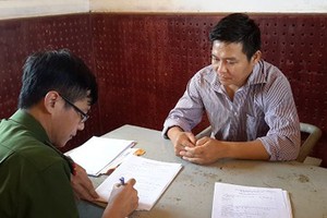 Nguyễn Sỹ Chí tại cơ quan công an.