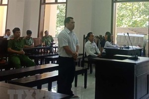 Bị cáo Văn Văn Nghĩa trước tòa. (Ảnh: Sỹ Tuyên/TTXVN)