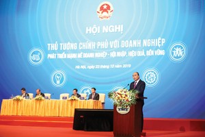 Thủ tướng Nguyễn Xuân Phúc phát biểu chỉ đạo tại Hội nghị Thủ tướng Chính phủ gặp doanh nghiệp sáng 23/12.