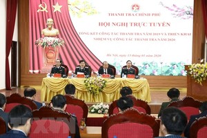 Phó Thủ tướng Thường trực Trương Hòa Bình với lãnh đạo Thanh tra Chính phủ chủ trì Hội nghị. (Ảnh: Văn Điệp/ TTXVN)