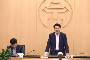 Chủ tịch Ủy ban Nhân dân thành phố, Trưởng Ban Chỉ đạo phòng, chống dịch COVID-19 thành phố Hà Nội, Nguyễn Đức Chung. (Ảnh: Văn Điệp/TTXVN).