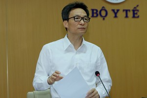 Phó thủ tướng Vũ Đức Đam chủ trì họp Ban Chỉ đạo quốc gia chống Covid-19 trong chiều 25/3. Ảnh: VGP.