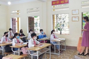 Bộ Y tế yêu cầu học sinh ngồi so le, cách nhau 1,5m trong lớp