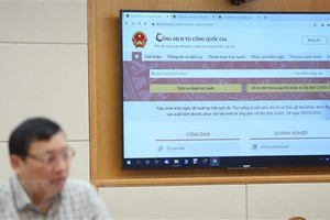 Trang thông tin hướng dẫn nộp thuế cá nhân và doanh nghiệp trên Cổng dịch vụ công Quốc gia. (Ảnh: Dương Giang/TTXVN).