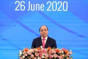 Thủ tướng Nguyễn Xuân Phúc, Chủ tịch ASEAN 2020 phát biểu khai mạc Hội nghị Cấp cao ASEAN lần thứ 36. (Ảnh: Thống Nhất/TTXVN).