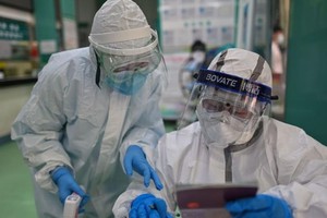 Chuyên gia điều tra nguồn gốc Covid-19 của WHO sẽ tới Trung Quốc ngày 14/1. Ảnh: Sky News.