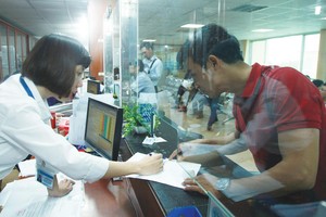 Quy trình khởi sự kinh doanh giảm từ 8 thủ tục với 16 ngày xuống chỉ còn 3 thủ tục với 6 ngày. Ảnh: Dũng Minh.