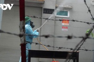 Phun xịt khử khuẩn ở Hẻm 415 Nguyễn Văn Công, nơi có cơ sở hoạt động điểm nhóm Hội thánh truyền giáo Phục Hưng.