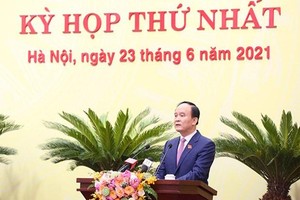 Ông Nguyễn Ngọc Tuấn, Chủ tịch Hội đồng Nhân dân thành phố Hà Nội khóa XV phát biểu tại phiên khai mạc Kỳ họp HĐND thành phố. (Ảnh: PV/Vietnam+).