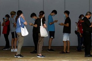 Số ca mắc trong cộng đồng ở Singapore đã tăng lên 88 trường hợp ngày 18/7, cao nhất kể từ tháng 8/2020. Ảnh: Reuters.