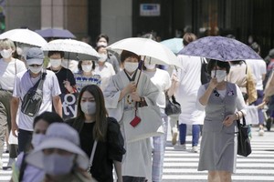 Nhiều ý kiến chuyên gia cho rằng sự kiện Olympic Tokyo 2020 cũng khiến cho số ca nhiễm tại Nhật Bản tăng nhanh. (Ảnh: AP).