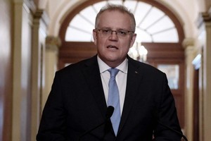 Thủ tướng Australia Scott Morrion yêu cầu các địa phương mở cửa biên giới vào dịp Giáng sinh tới. Ảnh: Olivier Douliery.