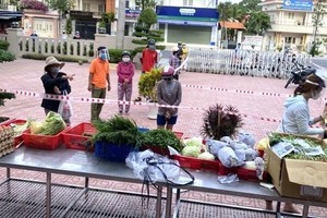 Một điểm bán hàng bình ổn của Tổng công ty Công nghiệp thực phẩm Đồng Nai (Dofico) ở thành phố Biên Hòa. (Ảnh: TTXVN phát).