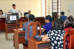 Quang cảnh buổi đấu giá. (Nguồn: baoyenbai).