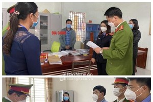 Tống đạt quyết định khởi tố đối với 2 bị can Lê Minh Tâm và Phạm Thị Thanh Thủy. (Nguồn: baonghean.vn)