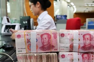 Quyết định cắt giảm 25 điểm cơ bản tỷ lệ dự trữ bắt buộc của Ngân hàng Trung ương Trung Quốc được kỳ vọng sẽ bơm 500 tỷ nhân dân tệ thanh khoản vào nền kinh tế. Ảnh: AFP.