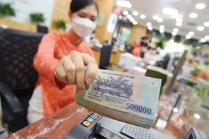 Biên lãi ròng ngành ngân hàng vẫn có khả năng mở rộng trong giai đoạn tới.