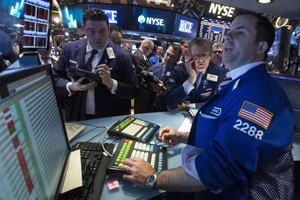 Phố Wall hồi phục tốt trong phiên đầu tuần mới - Ảnh: Reuters