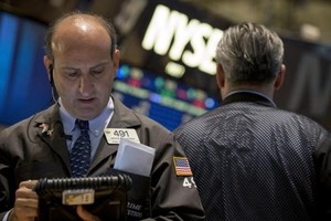 Phố Wall có phiên khởi sắc sau thông tin về khả năng FED chưa sớm tăng lãi suất - Ảnh: Reuters