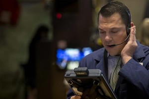 Phố Wall hồi trở lại sau dữ liệu kinh tế khả quan vừa được công bố - Ảnh: Reuters