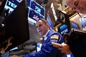 Liên tiếp nhận các thông tin tích cực, phố Wall có phiên tăng mạnh hôm thứ Ba - Ảnh: AFP