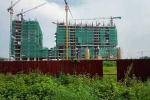 Hình ảnh thực tế của Dự án Gemek Tower ngày 15/6. Hiện Dự án đang xây đến tầng 14 và bàn giao căn hộ vào quý II/2016