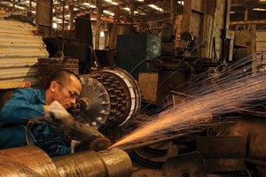 Sự chậm trễ hay không thực hiện đúng của các bộ, ngành về điều kiện kinh doanh sẽ cản trở quyền tự do kinh doanh của doanh nghiệp. Ảnh: Đức Thanh