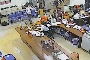 Nhận dạng kẻ nổ súng cướp ngân hàng ở Đăk Lăk