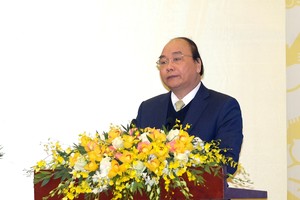 Thủ tướng Nguyễn Xuân Phúc phát biểu tại Hội nghị. Ảnh VGP/Quang Hiếu
