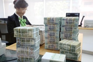 Tỷ lệ nợ xấu của các ngân hàng đã giảm xuống dưới 2%. Trong ảnh: Vietcombank - một ngân hàng tích cực trong xử lý nợ xấu.