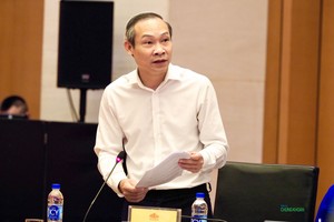 Ông Phan Đức Hiếu, Uỷ viên thường trực Uỷ ban Kinh tế của Quốc hội phát biểu về 12 điểm mới nhất của dự thảo Luật Đất đai (sửa đổi) sáng 4/8 (Ảnh: M.Minh)