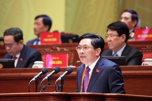 Phó trưởng ban Nội chính Trung ương Đặng Văn Dũng trình bày tham luận - Ảnh: TTXVN.