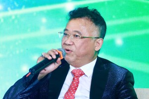 Ông Đặng Thành Tâm, Chủ tịch Chủ tịch Tổng công ty Phát triển Đô thị Kinh Bắc (KBC) chia sẻ tại hội thảo. Ảnh: Dũng Minh